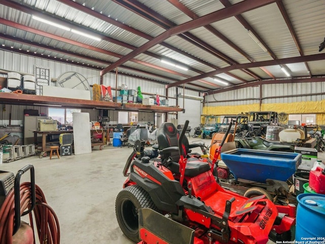 7803 US Highway 181, Falls City, TX 78113 - garage featuring metal wall and a workshop area