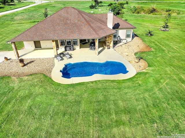 7803 US Highway 181, Falls City, TX 78113 - view of pool featuring a patio and a yard