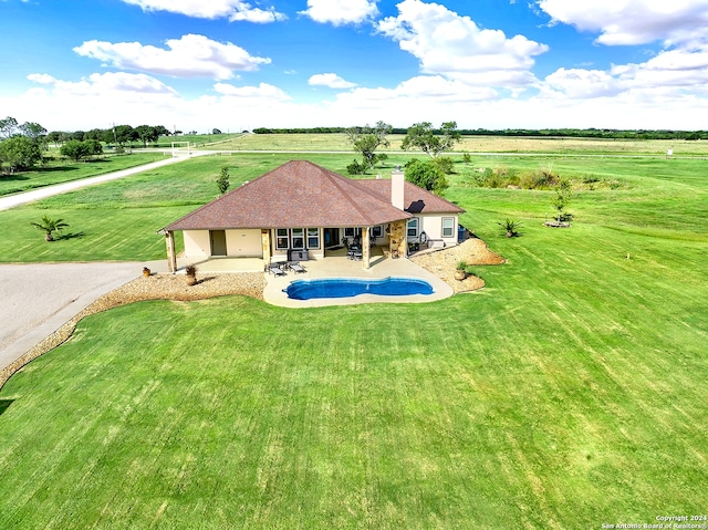 7803 US Highway 181, Falls City, TX 78113 - swimming pool featuring a yard, a patio, and a rural view