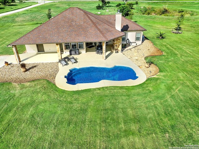 7803 US Highway 181, Falls City, TX 78113 - swimming pool with a patio area and a lawn