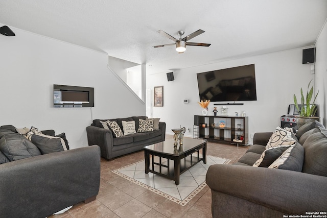 tiled living room with ceiling fan