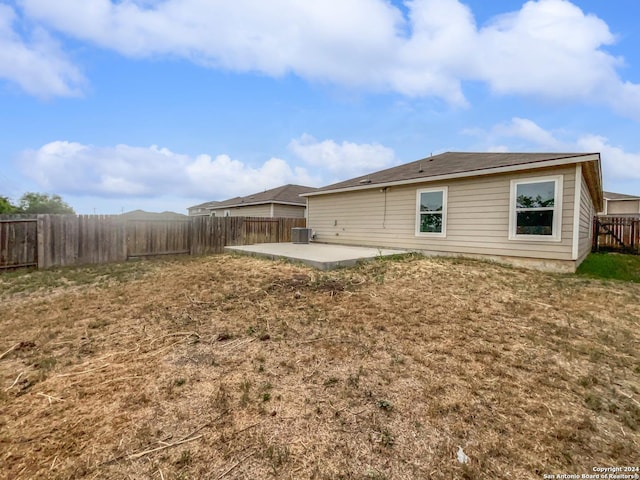 rear view of house featuring a patio