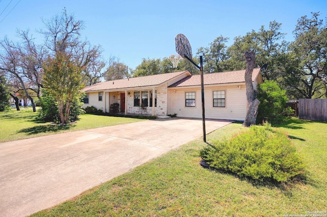 ranch-style house with a front yard