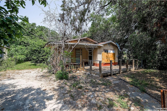 view of front of house featuring a deck