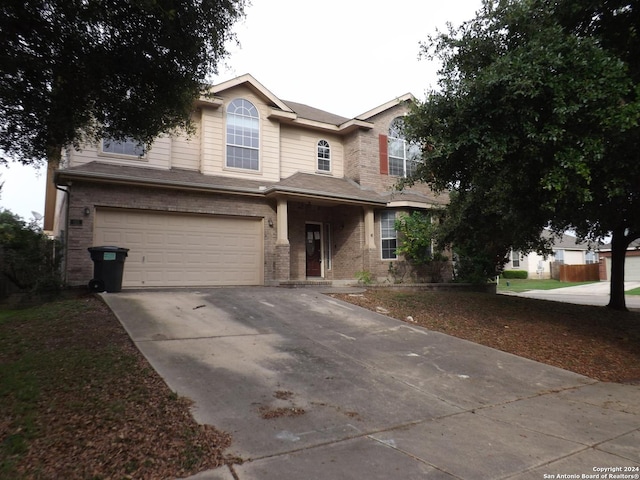 view of front of property with a garage