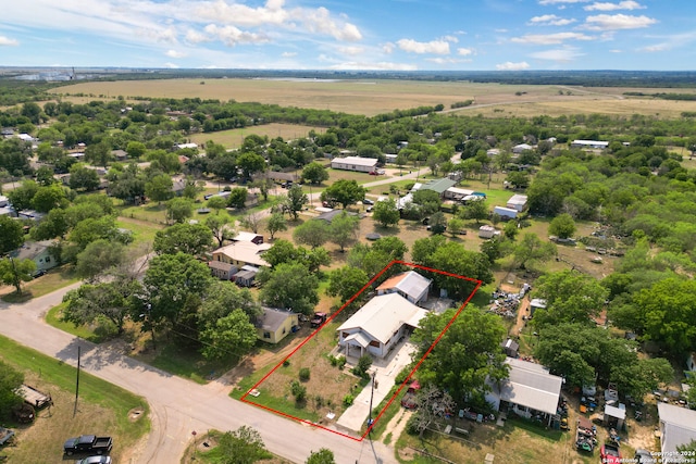 birds eye view of property featuring a rural view