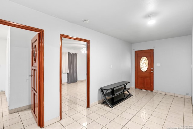 entrance foyer featuring light tile patterned floors