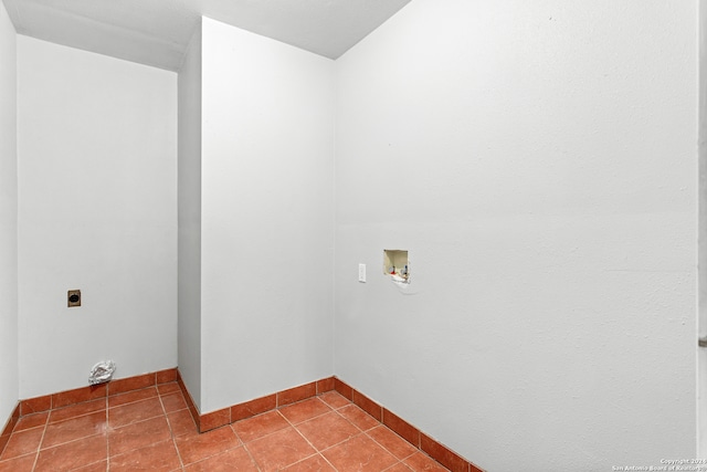 washroom featuring tile floors, washer hookup, and electric dryer hookup