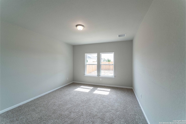 empty room with carpet floors