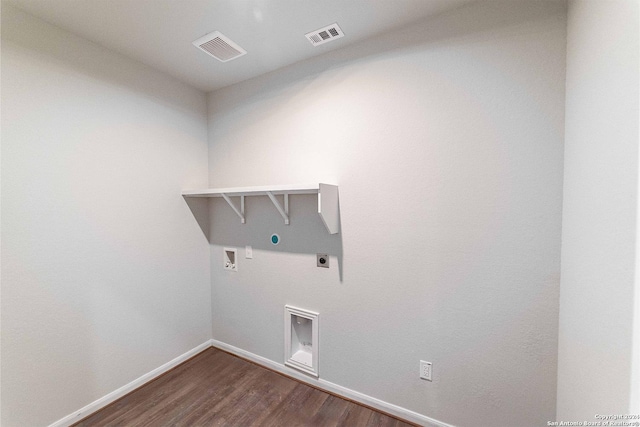 laundry area featuring hookup for an electric dryer, hookup for a washing machine, hardwood / wood-style flooring, and gas dryer hookup