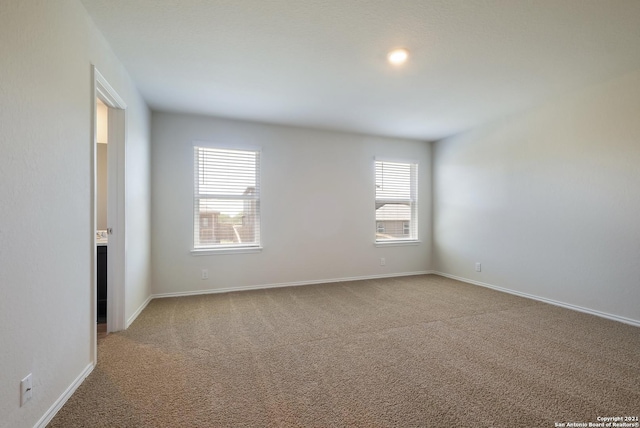 empty room featuring carpet