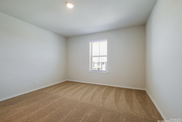 unfurnished room with carpet flooring