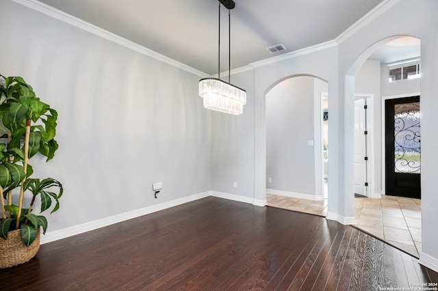 entrance foyer with light hardwood / wood-style flooring and ornamental molding