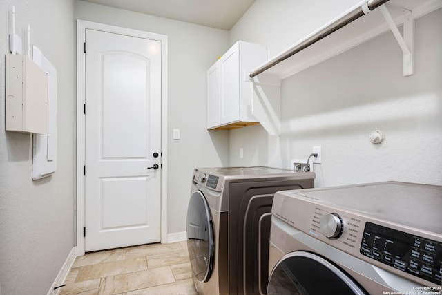 laundry room featuring cabinets, washer hookup, light tile flooring, and separate washer and dryer