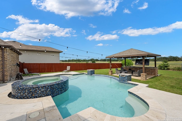 view of pool with an in ground hot tub, a patio area, a gazebo, and a lawn