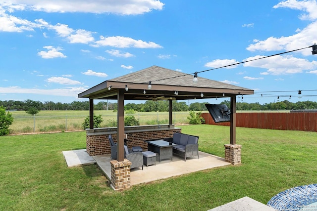 view of yard with a gazebo and a patio