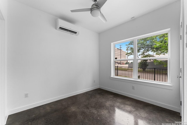 empty room featuring ceiling fan and a wall mounted AC