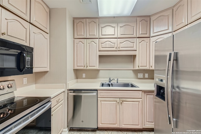 kitchen featuring sink and appliances with stainless steel finishes