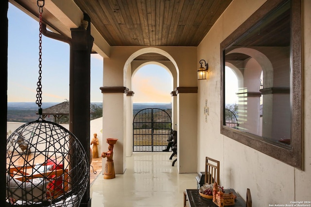 view of balcony at dusk