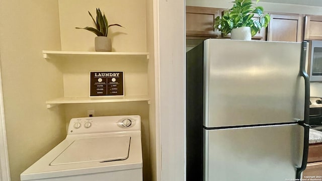 laundry area featuring washer / dryer