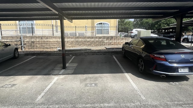 view of parking featuring a carport