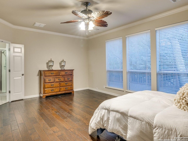 bedroom with ceiling fan, dark wood-type flooring, and ornamental molding