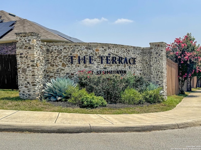 view of community sign