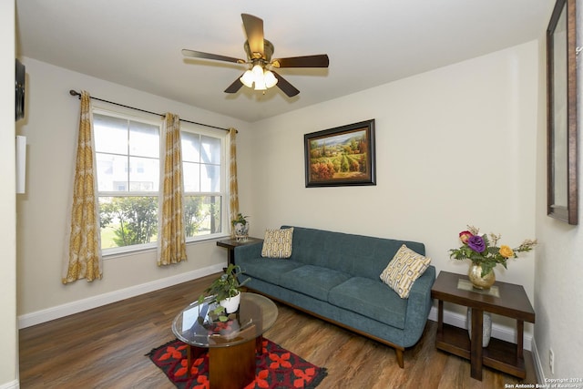 living room with hardwood / wood-style flooring and ceiling fan