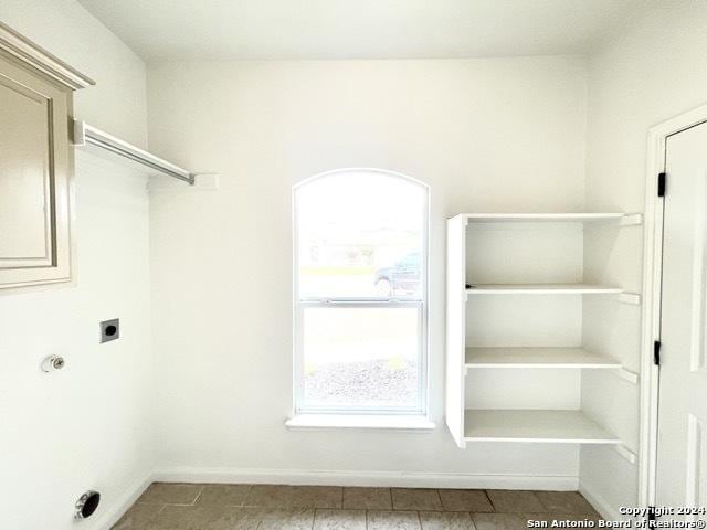 laundry area with hookup for an electric dryer