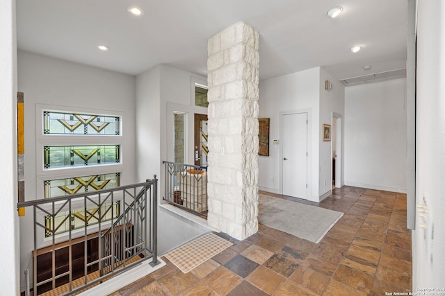 foyer featuring ornate columns