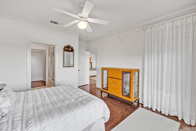 bedroom with ceiling fan, dark hardwood / wood-style flooring, and crown molding