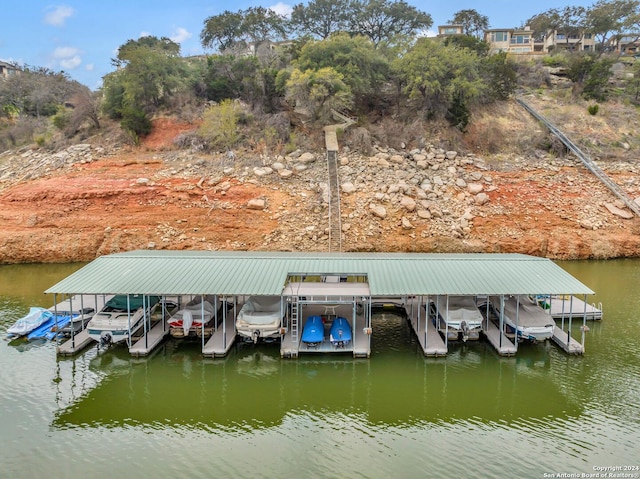 dock area featuring a water view