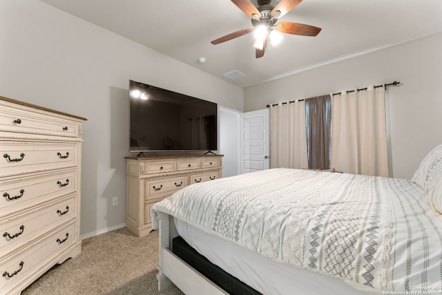 bedroom featuring light carpet and ceiling fan