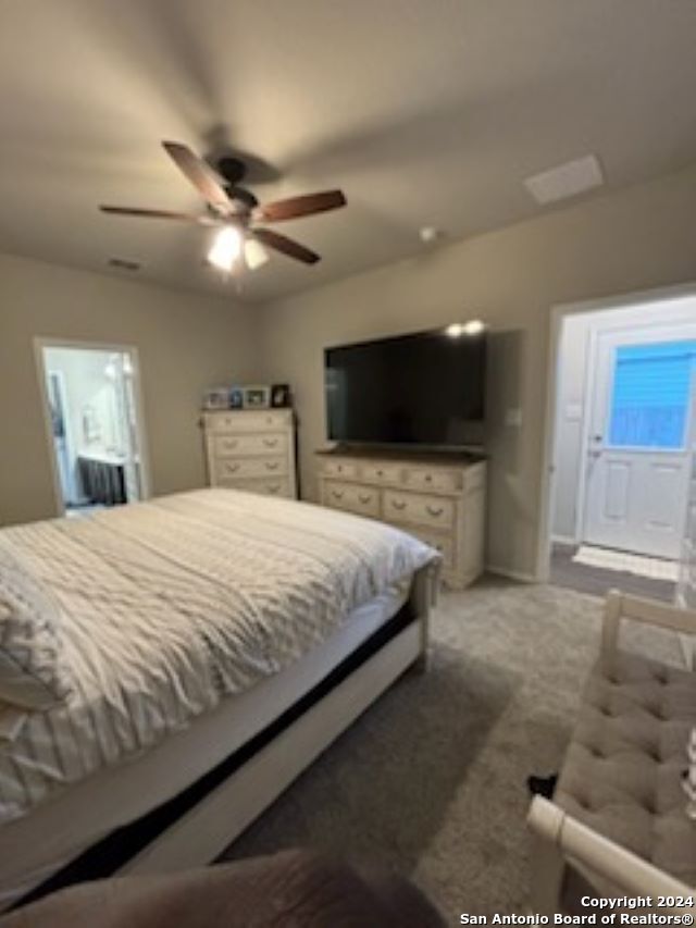 bedroom featuring carpet and ceiling fan