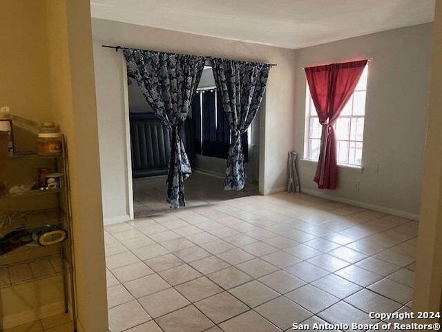 view of tiled spare room