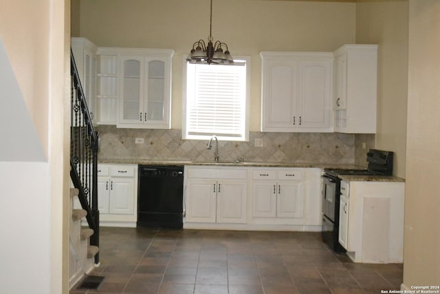 kitchen with pendant lighting, backsplash, black appliances, white cabinets, and sink