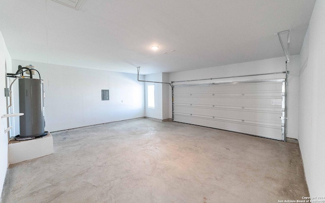 garage with water heater and electric panel