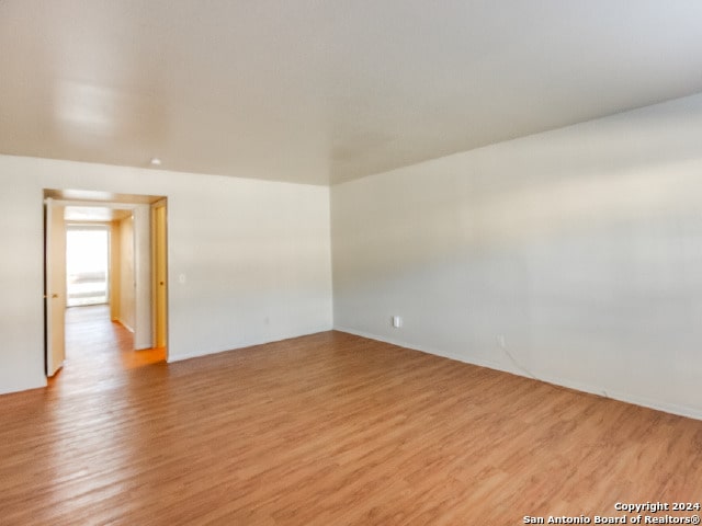 spare room featuring light hardwood / wood-style flooring