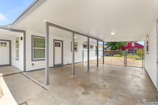 view of patio / terrace featuring a carport