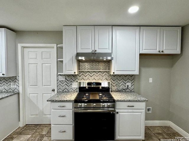 kitchen featuring white cabinetry, stainless steel range with gas cooktop, tasteful backsplash, and light stone counters