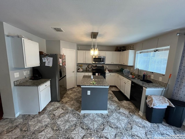 kitchen featuring a center island, sink, pendant lighting, white cabinets, and black appliances