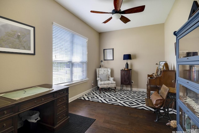 office with ceiling fan and dark hardwood / wood-style flooring