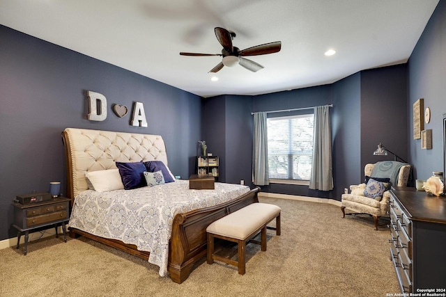 carpeted bedroom featuring ceiling fan