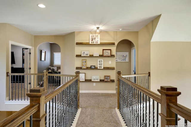 hallway featuring carpet floors