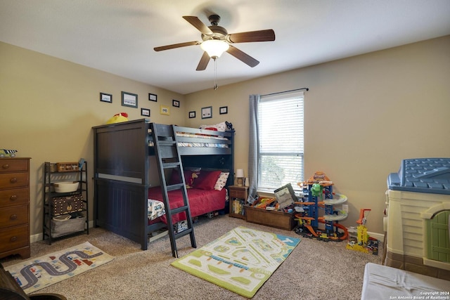 bedroom featuring ceiling fan and light colored carpet