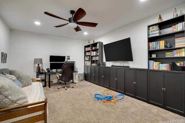 home office with carpet and ceiling fan