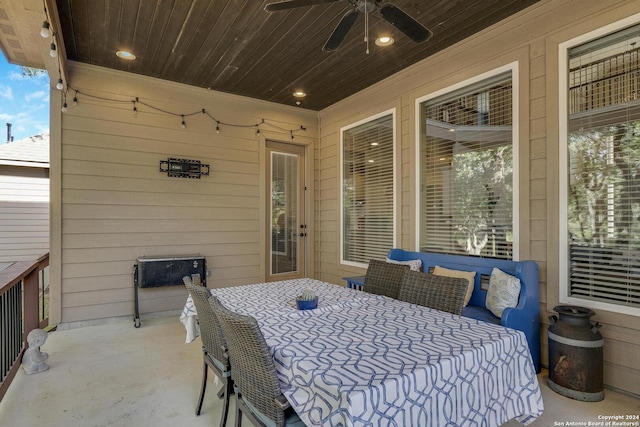 view of patio / terrace with an outdoor living space and ceiling fan