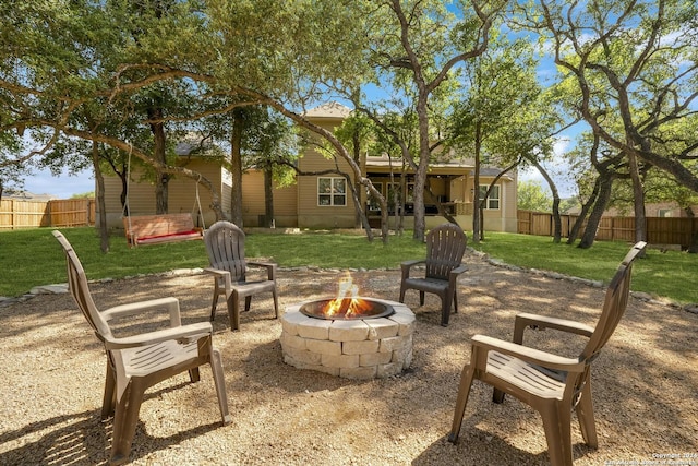 view of patio / terrace featuring a fire pit