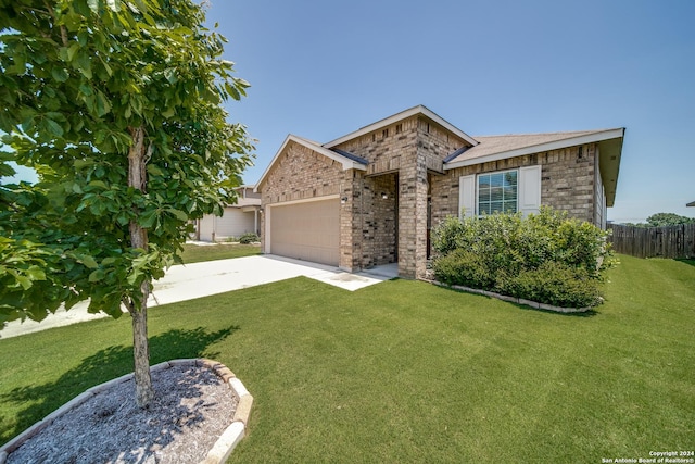 ranch-style house with a front yard and a garage