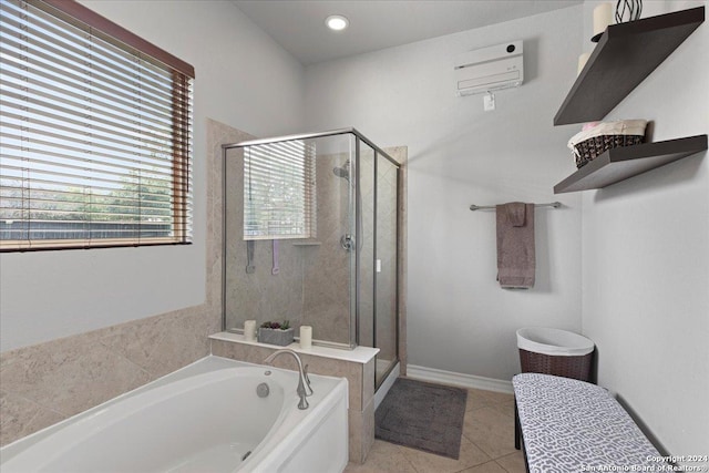 bathroom featuring tile patterned floors, separate shower and tub, and an AC wall unit